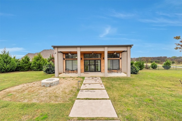 view of outdoor structure with an outdoor fire pit