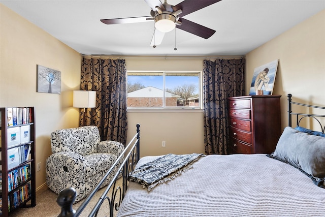 bedroom featuring carpet flooring and a ceiling fan