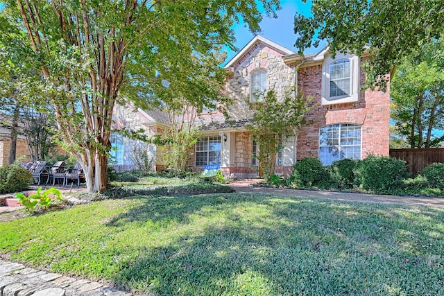 3611 Moroney Dr, Richardson, TX 75082 - traditional-style home with stone siding