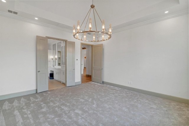 carpeted empty room with crown molding, recessed lighting, visible vents, a chandelier, and baseboards