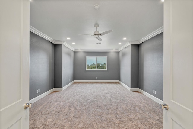 carpeted empty room featuring recessed lighting, ceiling fan, baseboards, and ornamental molding