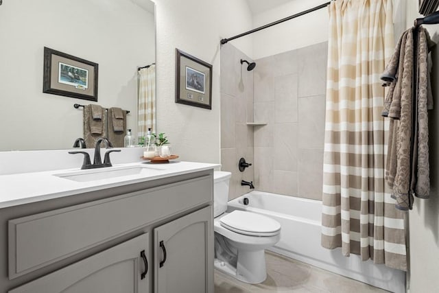 bathroom with toilet, shower / tub combo with curtain, and vanity