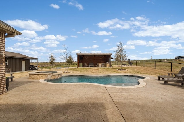 view of pool featuring a patio area, fence, and a pool with connected hot tub