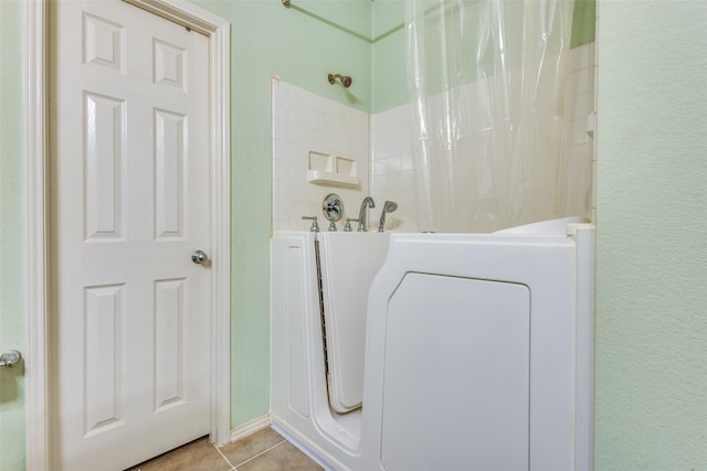 bathroom featuring tile patterned flooring