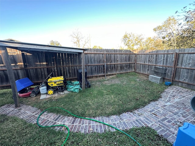 view of yard featuring a fenced backyard