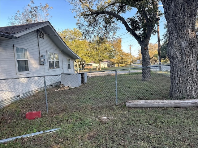 exterior space with crawl space, fence, and a yard