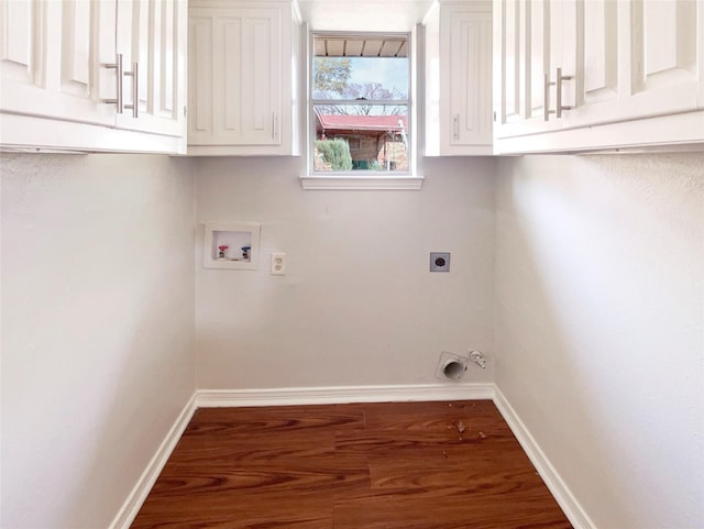 laundry room featuring washer hookup, cabinet space, electric dryer hookup, and baseboards