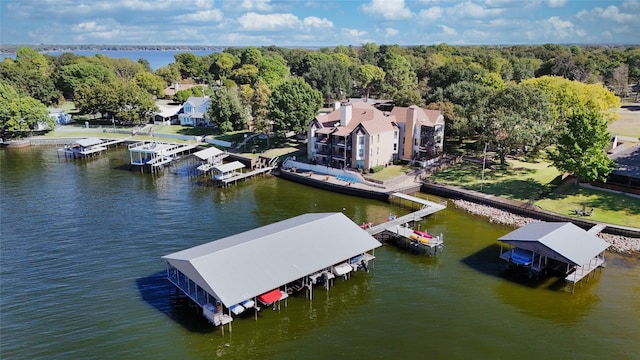 exterior space with boat lift and a water view