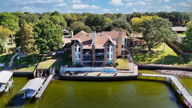 bird's eye view with a water view