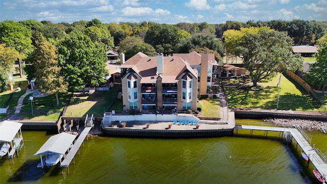 drone / aerial view with a water view