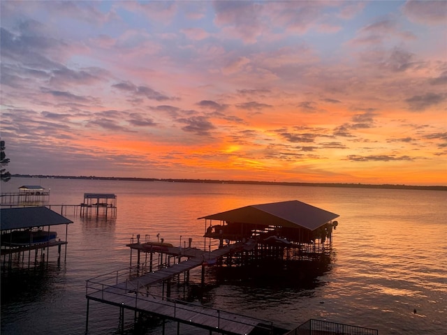 view of dock with a water view and boat lift