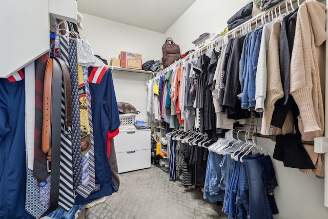 spacious closet featuring carpet floors