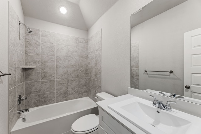 bathroom featuring toilet, shower / bathtub combination, vaulted ceiling, and vanity