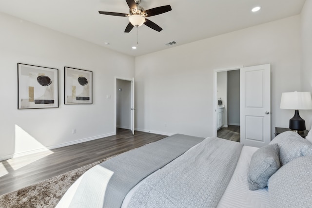 bedroom featuring recessed lighting, visible vents, baseboards, and wood finished floors