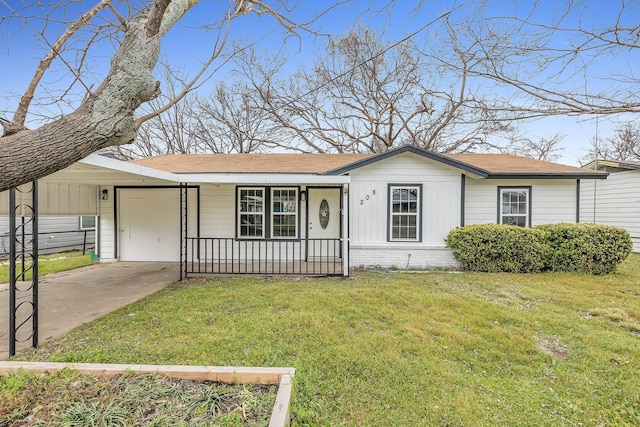 ranch-style home featuring a porch, brick siding, driveway, and a front lawn