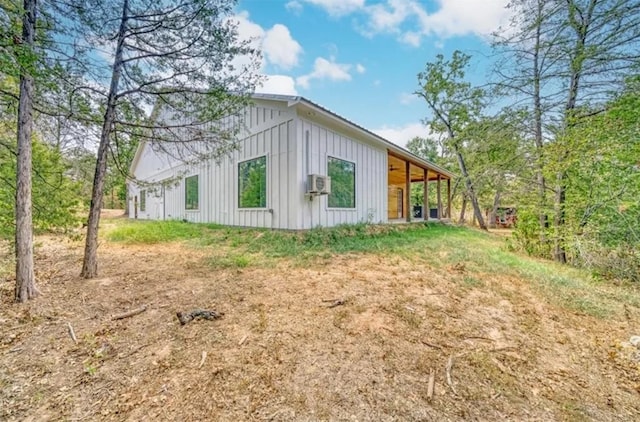 view of side of property featuring board and batten siding