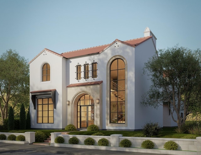 exterior space featuring stucco siding, french doors, and a tiled roof