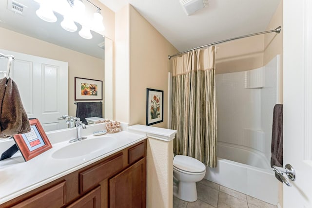 bathroom featuring shower / bath combination with curtain, visible vents, toilet, vanity, and tile patterned floors