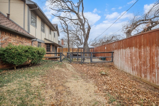 view of yard with fence