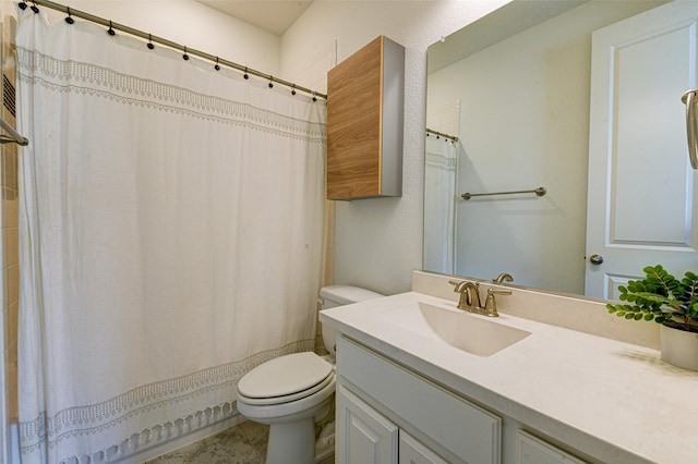 full bathroom with curtained shower, vanity, and toilet