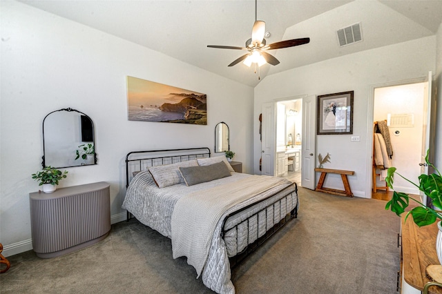 carpeted bedroom with lofted ceiling, visible vents, baseboards, and ensuite bathroom