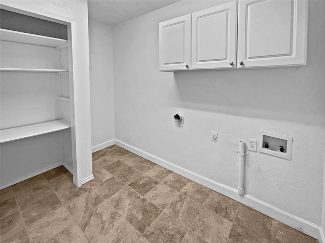 clothes washing area with cabinet space, baseboards, gas dryer hookup, hookup for a washing machine, and electric dryer hookup