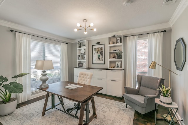 office with ornamental molding, dark wood-style flooring, plenty of natural light, and visible vents