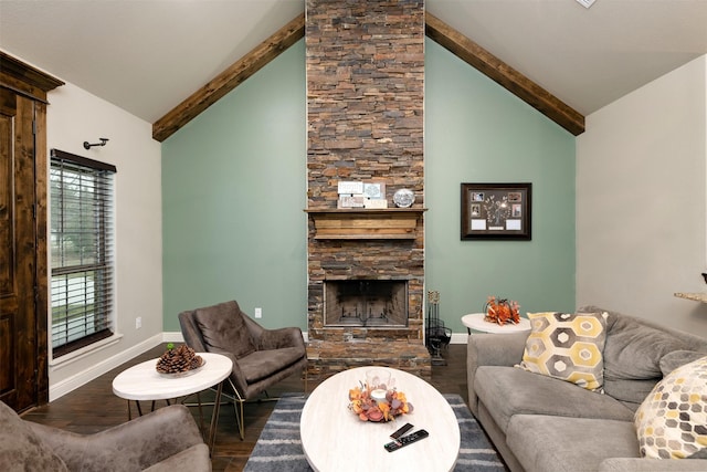 living area featuring beam ceiling, a fireplace, baseboards, and wood finished floors