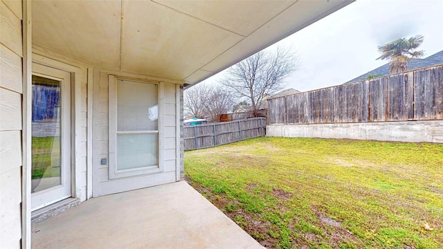 view of yard with a fenced backyard