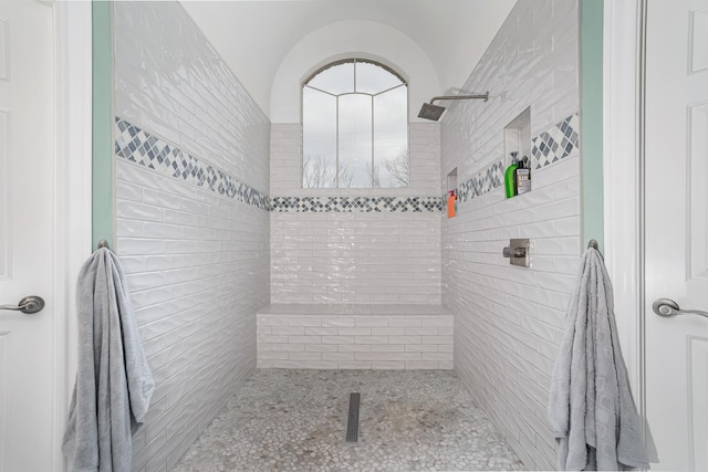 full bath featuring tiled shower