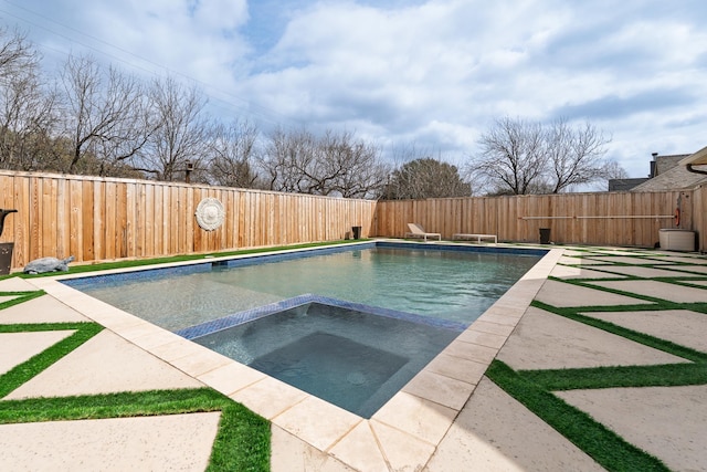 view of pool with a fenced backyard, a fenced in pool, and an in ground hot tub