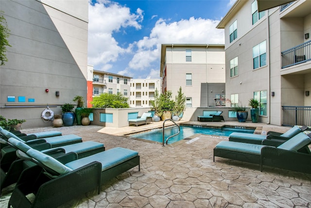 community pool featuring a patio