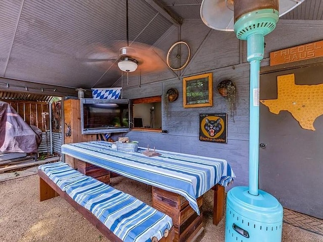 bedroom with vaulted ceiling and carpet flooring