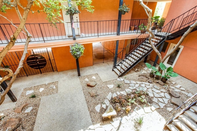 view of patio / terrace featuring stairway