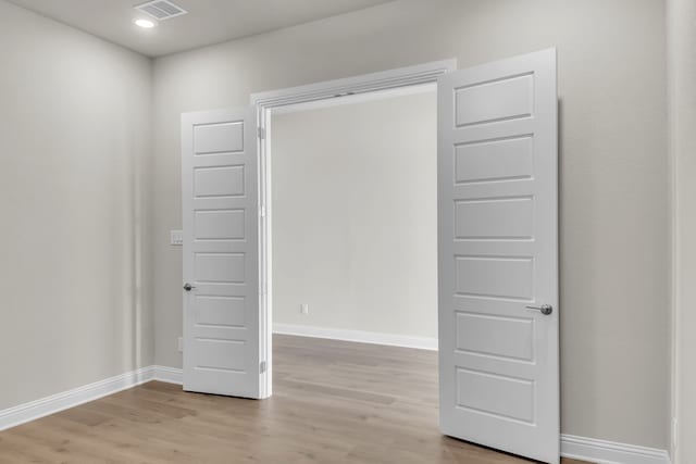 5509 Gaelic Dr, Celina, TX 75009 - unfurnished room with visible vents, baseboards, light wood finished floors, and recessed lighting