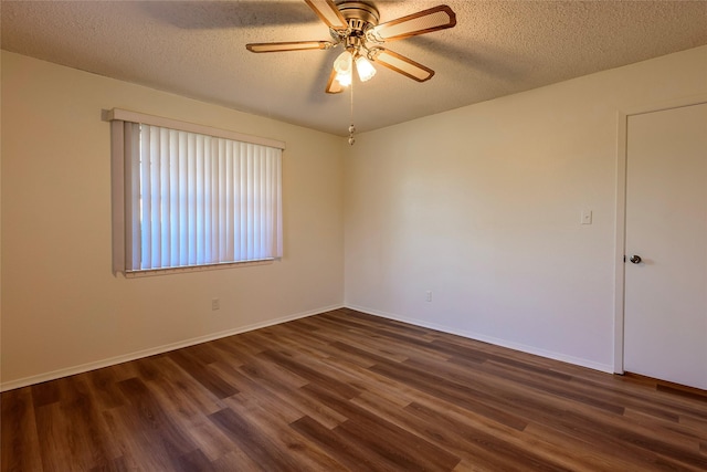 unfurnished room featuring a textured ceiling, wood finished floors, a ceiling fan, and baseboards