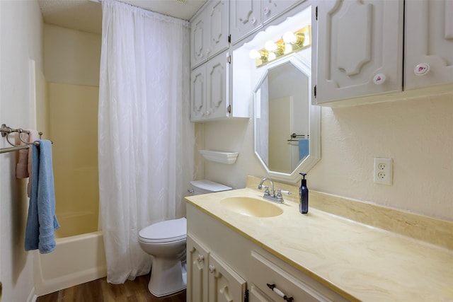 full bath featuring vanity, shower / bath combination with curtain, wood finished floors, and toilet