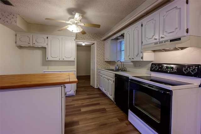 kitchen featuring wallpapered walls, dishwasher, butcher block countertops, under cabinet range hood, and range with electric stovetop