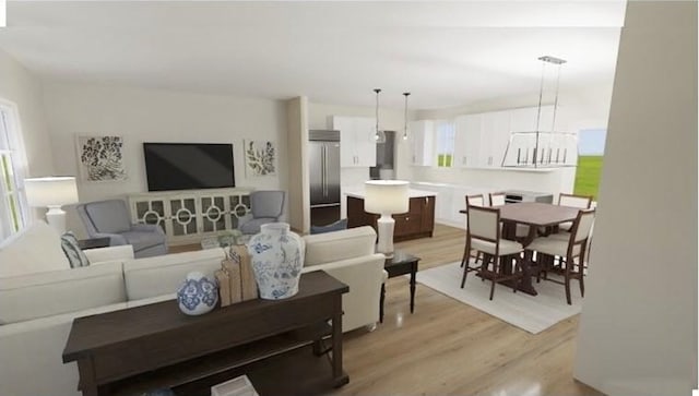 living room featuring light wood-style flooring and a notable chandelier