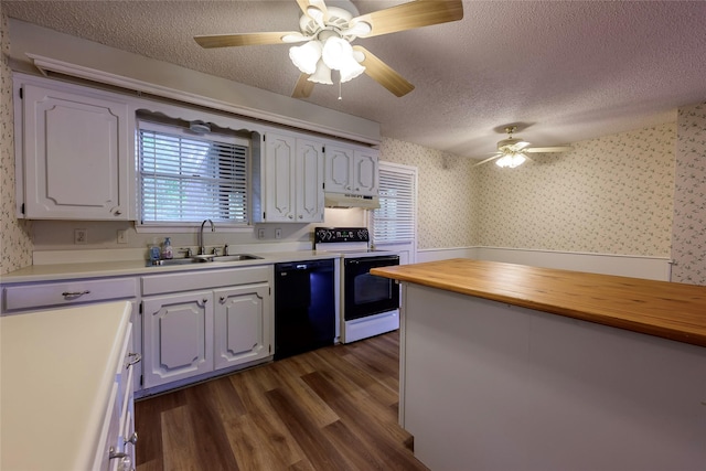 kitchen with black dishwasher, electric range, a sink, wood counters, and wallpapered walls