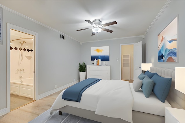 bedroom with crown molding, light wood finished floors, visible vents, connected bathroom, and baseboards