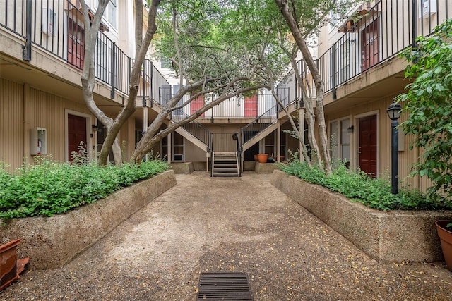 view of property's community featuring stairway