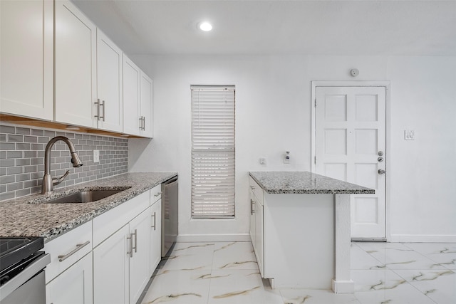 kitchen with light stone counters, marble finish floor, decorative backsplash, a sink, and dishwasher