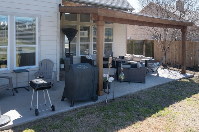 view of patio / terrace featuring fence and an outdoor hangout area