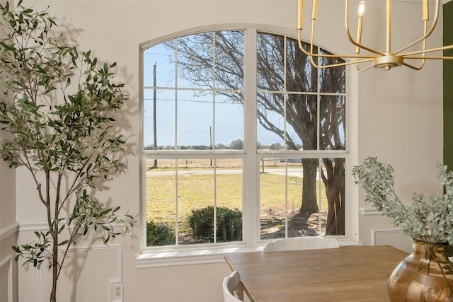 dining area featuring an inviting chandelier