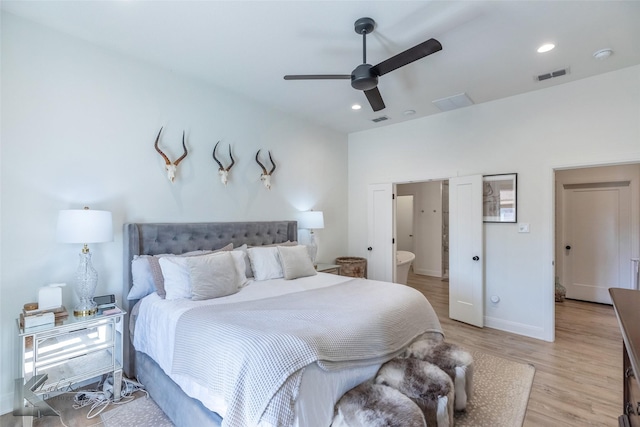 bedroom with light wood-style flooring, visible vents, a ceiling fan, and recessed lighting