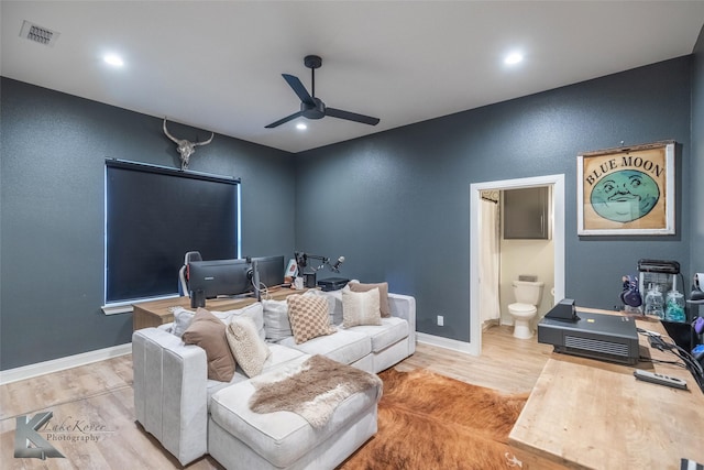 home theater room featuring recessed lighting, wood finished floors, visible vents, baseboards, and a ceiling fan