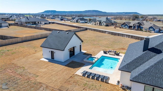 aerial view with a residential view and a mountain view