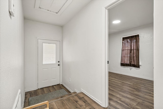 entryway with wood finished floors