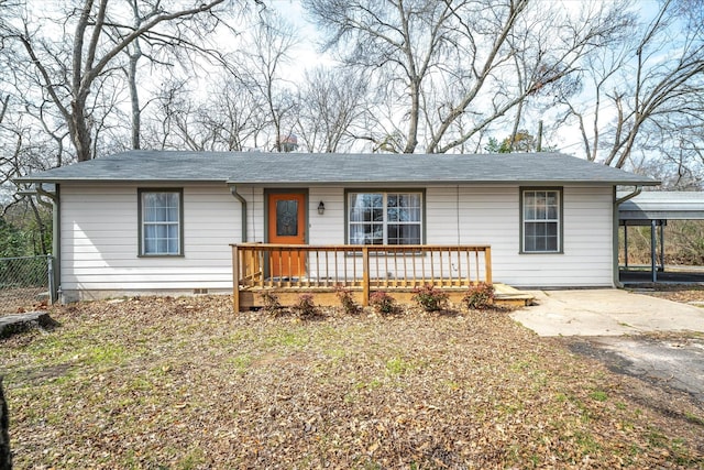 ranch-style house featuring a porch, crawl space, and fence